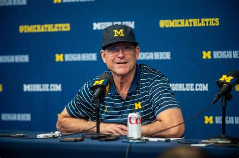 Coach Jim Harbaugh banned from 3 games over sign-stealing allegations. Michigan asks judge for stay